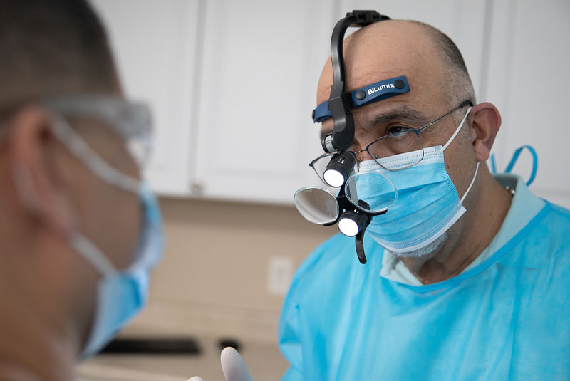 doctor during a guided dental implant surgery